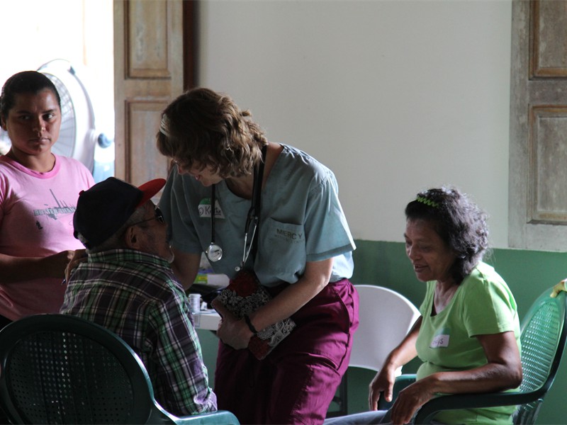 Doctor Kathy counseling an older Gentleman