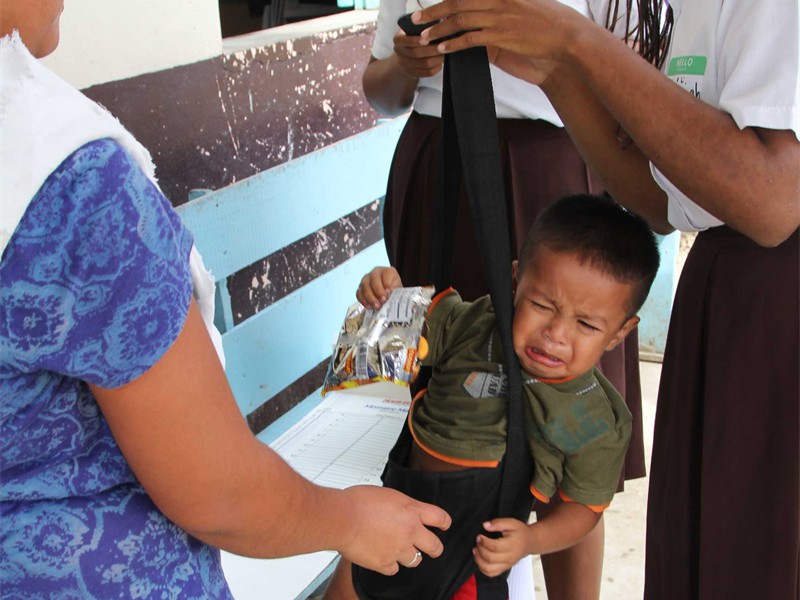 Weighing a child